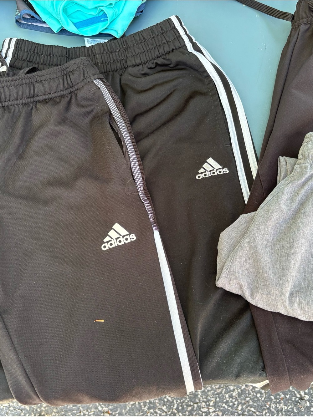 FOUR pairs of boys athletic pants size M/L for 10/12 year old